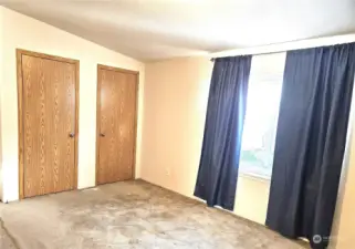 Primary bedroom features two closets.