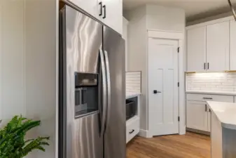 Kitchen - Photos are digitally staged for visualization, furniture and some interior decor not included.