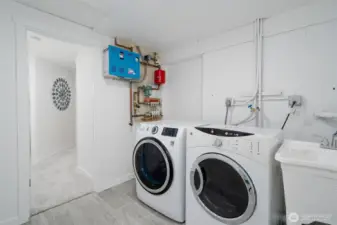 Washer & Dryer Convey, on the wall is the Radiant Heating for the entire home
