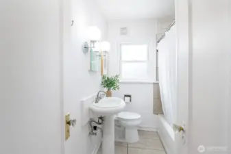 The full bath is on the main floor.