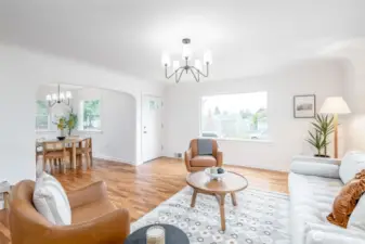 The large windows in the living room and dining room offers lovely natural light!