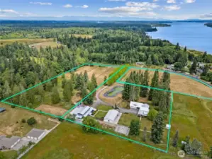 Sitting on 18+ acres and comprised of three separate parcels, this property delivers privacy, flexibility, and investment potential.