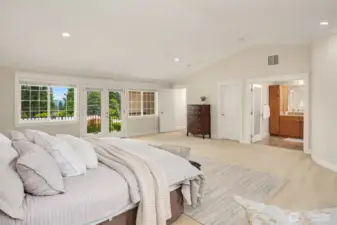 2nd floor primary suite with French doors to balcony