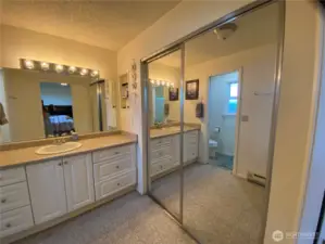 Massive amounts of closet space to the right with full mirror doors!