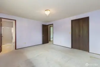 Primary bedroom with attached 3/4 bath.