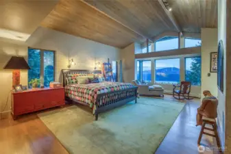 Main bedroom ensuite with sitting area overlooking Turtleback Mountain. 180 degree water views up and down East Sound.