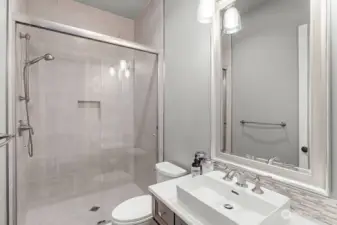 Main level 3/4 bath that is handy to the  kitchen and flex space.