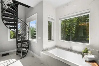 Spiral staircase leading up to view office!