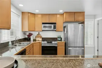 Granite Counters and tons of cabinet space