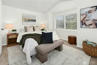 Primary suite with fresh paint, plush new carpet, and abundant natural light.