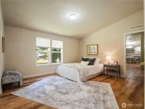 Another view of the primary bedroom.