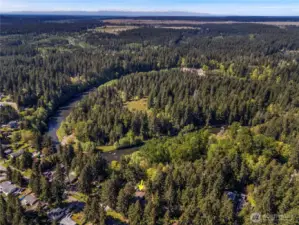 This property sits high above the Nisqually River, with a peek--a-boo view of the river from the backyard.