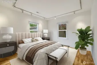 Here is the first of two bedrooms.  Each room has two windows and a good size closet with built-in storage space.