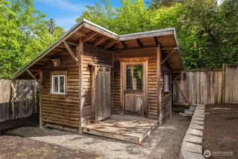 This is a closer look at the building that could be your art studio, gardening shed, she shed or man cave!  Right now it serves as a storage shed.