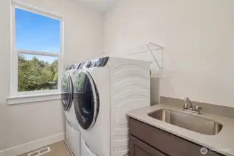 Pic is of similar home, layout and materials of surfaces may vary.  Cabinets to be white in actual home.