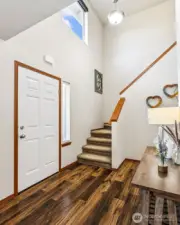 As you enter, you will find gorgeous flooring and a dramatic 2-story entry with lots of natural light.