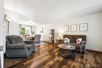 To your right at entry you will find a large living room and formal dining.