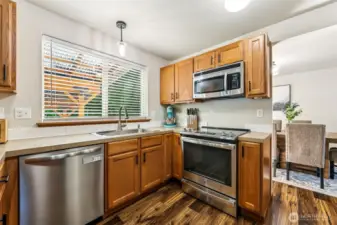 Kitchen view into dining, love the huge window!