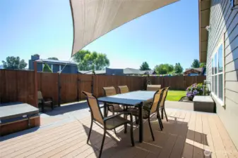 Trex decking and hot tub area in the fully fenced backyard