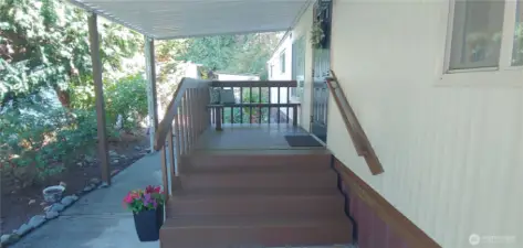 welcoming covered front porch with built in bench seating