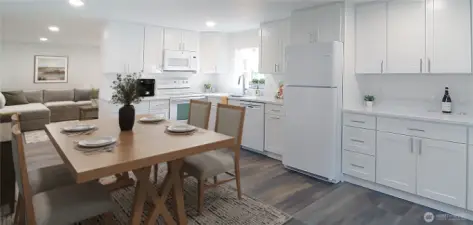 kitchen has enough room for dining table and a large gathering- virtually staged