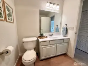 The bathroom has a new sink/countertop.