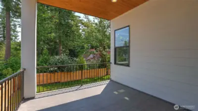 Covered deck is ideal for year-round enjoyment.