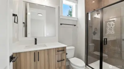 Main Level Guest Bedroom Suite's 3/4 Bath.