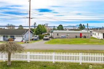 View from living room, primary bedroom, front yard