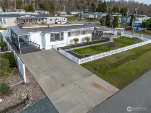 Fully fence landscaped level large lot with two driveway - ample parking space.