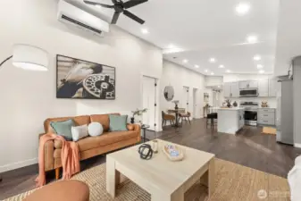 View of kitchen from corner, primary bedroom is the first door on left.