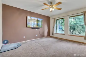 TV stays with the house. Family room is connected to the kitchen making for a great space to entertain.