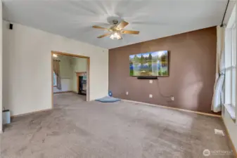 Pad in the corner is for a pellet stove - capped hole in the wall is for the stove pipe.