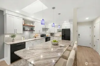 Remodeled kitchen with huge island. Virtual Stage.