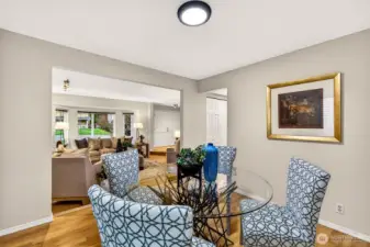 Open to the living room yet distinctly defined, the dining area benefits from great natural light and a seamless connection to the heart of the home — an ideal configuration for flexible living in a setting that feels both comfortable and well-considered.