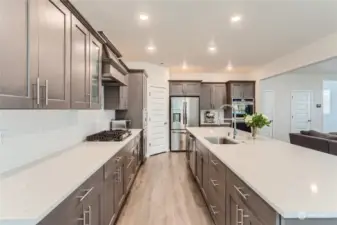 You will love all the storage space, soft close cabinets, and countertops!