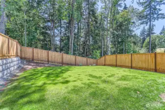 Nice level and fenced backyard