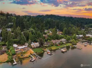 This exceptional waterfront home boasts 85' of prime lake frontage on a sprawling 0.58-acre lot.