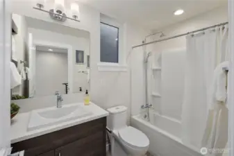 2nd upper floor bathroom of a previous model home in the Avenue plan.  The Courtyard plan also has an upper floor guest bathroom.