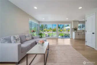 this open family room / kitchen nook or dining room area in the NW corner of the main floor can be configured in many different ways as your needs and lifestyle  wants it to be