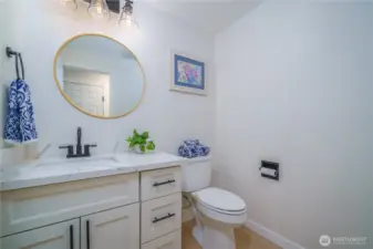 ground floor half bath, next to laundry room