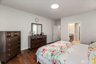 Here is the main floor primary bedroom with 5-piece bath and walk in closet.
