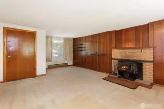 Come into a spacious living room.  Woodstove for those cold winter nights.