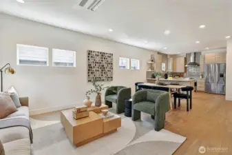 Light & bright main floor living with dining, kitchen, powder room and mudroom.