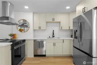 Kitchen with stainless steel appliances and Quartz countertops