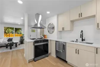 Kitchen looks into Living Room