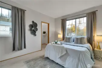 Primary Bedroom with Walk-In Closet & Two Windows