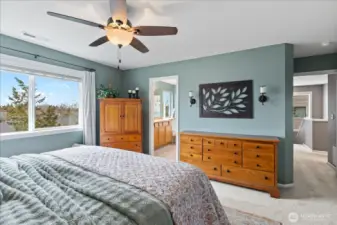 West facing primary bedroom has stunning evening sunsets