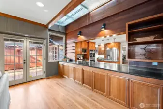 Opening to kitchen. Plenty of built-in storage