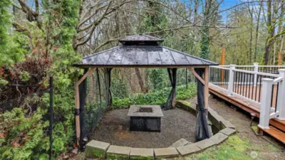 Tucked away for privacy, this gazebo creates the perfect space to unwind and entertain outdoors.